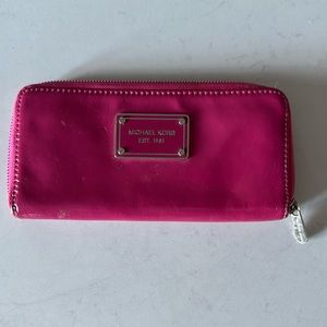 Pink Michael Kors zip wallet